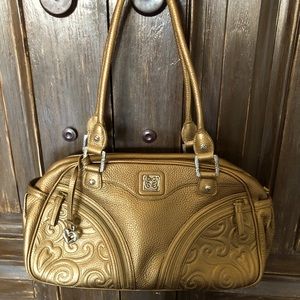 Gentle used Brighten leather double handle Handbag.